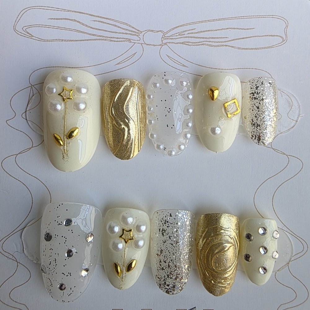 Elegant Gold and Cream Nail Art Set